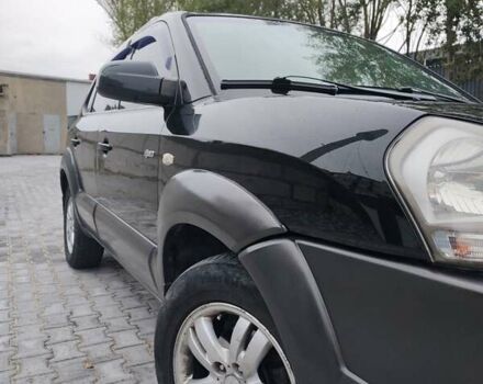 Черный Хендай Туксон, объемом двигателя 2.7 л и пробегом 280 тыс. км за 7200 $, фото 19 на Automoto.ua