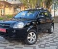 Чорний Хендай Туксон, об'ємом двигуна 2 л та пробігом 190 тис. км за 8300 $, фото 11 на Automoto.ua