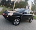 Черный Хендай Туксон, объемом двигателя 2 л и пробегом 192 тыс. км за 7950 $, фото 1 на Automoto.ua
