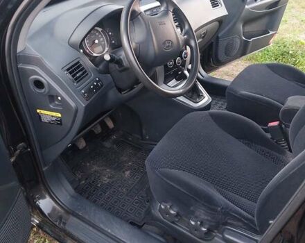 Черный Хендай Туксон, объемом двигателя 1.98 л и пробегом 200 тыс. км за 7100 $, фото 9 на Automoto.ua