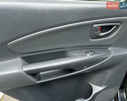 Черный Хендай Туксон, объемом двигателя 2 л и пробегом 256 тыс. км за 7800 $, фото 4 на Automoto.ua