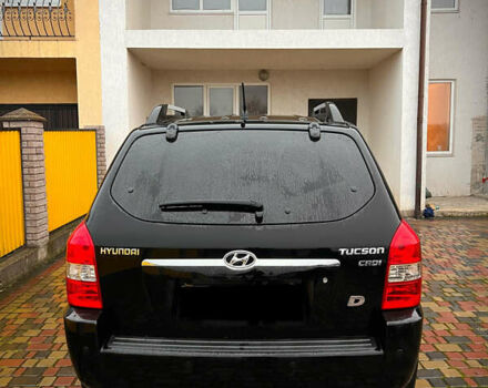 Черный Хендай Туксон, объемом двигателя 2 л и пробегом 151 тыс. км за 9100 $, фото 38 на Automoto.ua