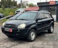 Черный Хендай Туксон, объемом двигателя 2 л и пробегом 177 тыс. км за 8940 $, фото 1 на Automoto.ua