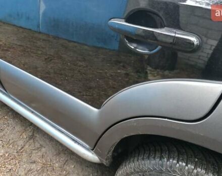 Чорний Хендай Туксон, об'ємом двигуна 2 л та пробігом 207 тис. км за 8200 $, фото 9 на Automoto.ua