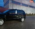 Чорний Хендай Туксон, об'ємом двигуна 2 л та пробігом 204 тис. км за 8000 $, фото 1 на Automoto.ua