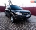 Черный Хендай Туксон, объемом двигателя 2 л и пробегом 280 тыс. км за 9500 $, фото 1 на Automoto.ua