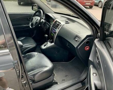 Черный Хендай Туксон, объемом двигателя 2.7 л и пробегом 266 тыс. км за 7700 $, фото 9 на Automoto.ua