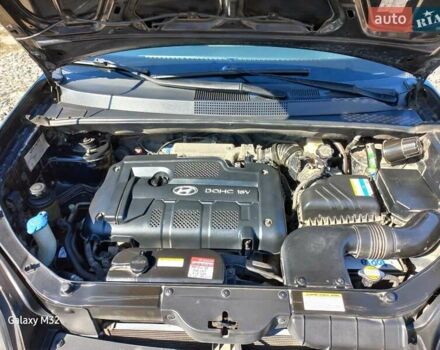 Черный Хендай Туксон, объемом двигателя 2 л и пробегом 219 тыс. км за 8500 $, фото 15 на Automoto.ua