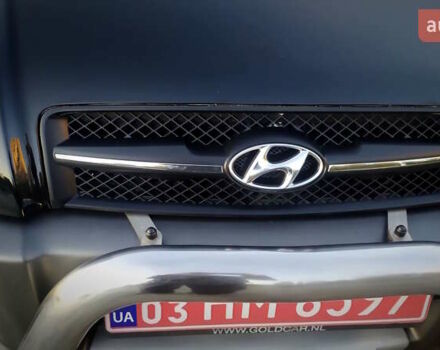 Черный Хендай Туксон, объемом двигателя 2 л и пробегом 230 тыс. км за 8600 $, фото 48 на Automoto.ua