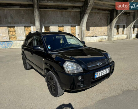 Черный Хендай Туксон, объемом двигателя 2 л и пробегом 189 тыс. км за 8250 $, фото 7 на Automoto.ua