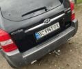 Чорний Хендай Туксон, об'ємом двигуна 2 л та пробігом 230 тис. км за 5999 $, фото 5 на Automoto.ua
