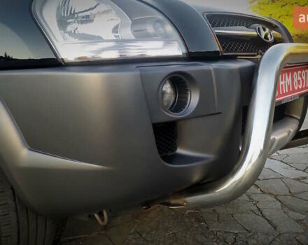 Черный Хендай Туксон, объемом двигателя 2 л и пробегом 230 тыс. км за 8600 $, фото 51 на Automoto.ua