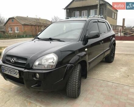 Черный Хендай Туксон, объемом двигателя 2 л и пробегом 210 тыс. км за 8999 $, фото 31 на Automoto.ua