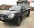 Черный Хендай Туксон, объемом двигателя 2 л и пробегом 210 тыс. км за 8999 $, фото 31 на Automoto.ua