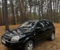 Черный Хендай Туксон, объемом двигателя 2 л и пробегом 240 тыс. км за 8800 $, фото 1 на Automoto.ua