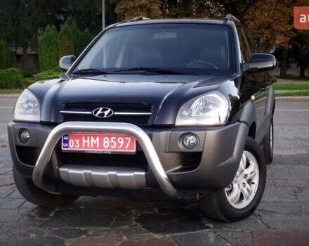 Черный Хендай Туксон, объемом двигателя 2 л и пробегом 230 тыс. км за 8600 $, фото 90 на Automoto.ua