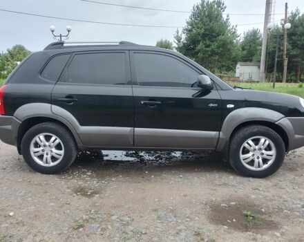 Черный Хендай Туксон, объемом двигателя 2 л и пробегом 160 тыс. км за 7600 $, фото 3 на Automoto.ua