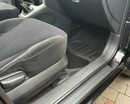 Черный Хендай Туксон, объемом двигателя 2 л и пробегом 218 тыс. км за 7600 $, фото 17 на Automoto.ua