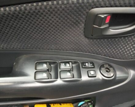 Черный Хендай Туксон, объемом двигателя 2 л и пробегом 240 тыс. км за 8800 $, фото 9 на Automoto.ua