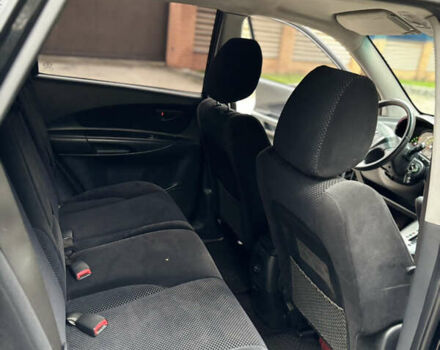 Черный Хендай Туксон, объемом двигателя 1.99 л и пробегом 266 тыс. км за 7500 $, фото 25 на Automoto.ua