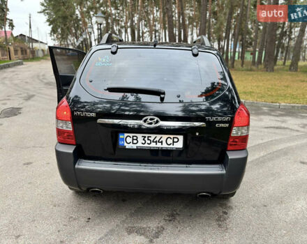Черный Хендай Туксон, объемом двигателя 1.99 л и пробегом 266 тыс. км за 7500 $, фото 20 на Automoto.ua
