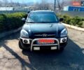 Чорний Хендай Туксон, об'ємом двигуна 2 л та пробігом 161 тис. км за 7700 $, фото 1 на Automoto.ua