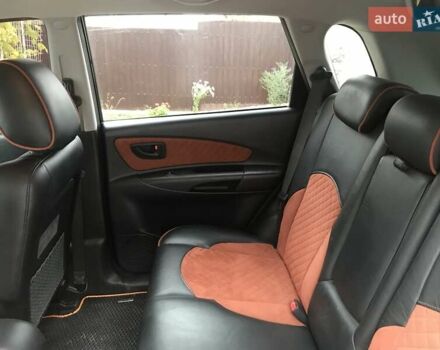 Черный Хендай Туксон, объемом двигателя 2 л и пробегом 210 тыс. км за 8999 $, фото 46 на Automoto.ua