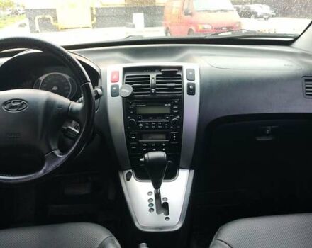 Черный Хендай Туксон, объемом двигателя 2.7 л и пробегом 280 тыс. км за 7200 $, фото 2 на Automoto.ua