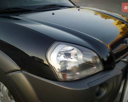 Черный Хендай Туксон, объемом двигателя 2 л и пробегом 230 тыс. км за 8600 $, фото 50 на Automoto.ua