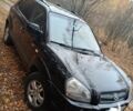 Черный Хендай Туксон, объемом двигателя 2 л и пробегом 240 тыс. км за 8800 $, фото 1 на Automoto.ua