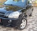 Чорний Хендай Туксон, об'ємом двигуна 2 л та пробігом 190 тис. км за 8300 $, фото 3 на Automoto.ua