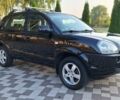 Черный Хендай Туксон, объемом двигателя 2 л и пробегом 190 тыс. км за 8150 $, фото 6 на Automoto.ua