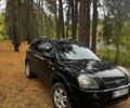 Черный Хендай Туксон, объемом двигателя 2 л и пробегом 240 тыс. км за 8800 $, фото 2 на Automoto.ua