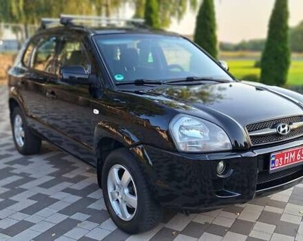 Черный Хендай Туксон, объемом двигателя 2 л и пробегом 190 тыс. км за 8150 $, фото 5 на Automoto.ua