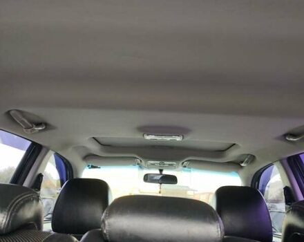 Черный Хендай Туксон, объемом двигателя 2.7 л и пробегом 280 тыс. км за 7200 $, фото 6 на Automoto.ua