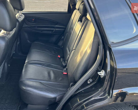 Черный Хендай Туксон, объемом двигателя 1.98 л и пробегом 243 тыс. км за 8500 $, фото 35 на Automoto.ua