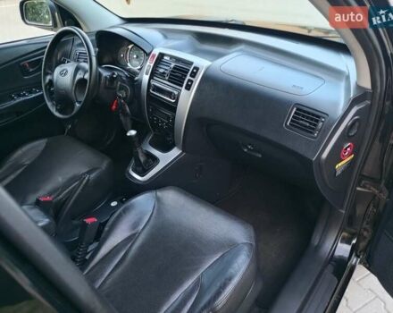 Чорний Хендай Туксон, об'ємом двигуна 1.98 л та пробігом 192 тис. км за 7950 $, фото 36 на Automoto.ua