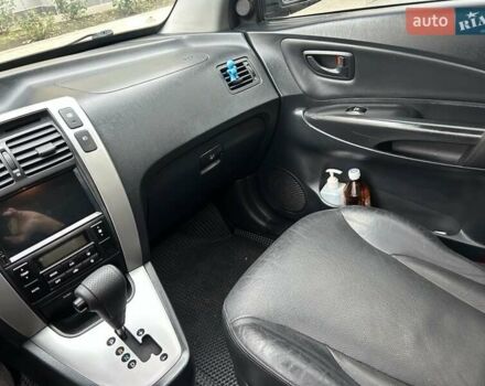 Черный Хендай Туксон, объемом двигателя 1.98 л и пробегом 147 тыс. км за 8000 $, фото 23 на Automoto.ua