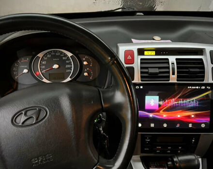 Черный Хендай Туксон, объемом двигателя 2 л и пробегом 151 тыс. км за 9100 $, фото 12 на Automoto.ua