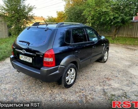 Черный Хендай Туксон, объемом двигателя 2.7 л и пробегом 145 тыс. км за 6950 $, фото 5 на Automoto.ua