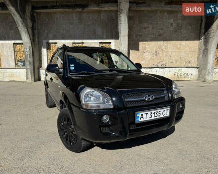 Черный Хендай Туксон, объемом двигателя 2 л и пробегом 189 тыс. км за 8250 $, фото 24 на Automoto.ua