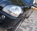 Черный Хендай Туксон, объемом двигателя 2 л и пробегом 190 тыс. км за 8150 $, фото 15 на Automoto.ua