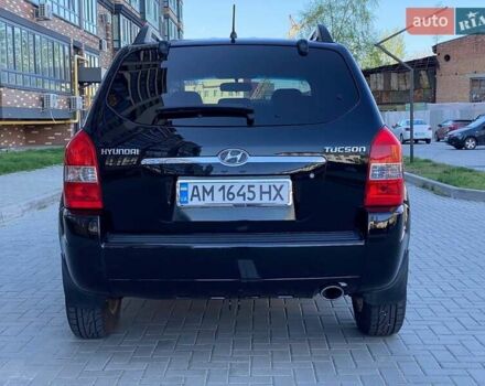 Черный Хендай Туксон, объемом двигателя 1.98 л и пробегом 286 тыс. км за 7300 $, фото 7 на Automoto.ua