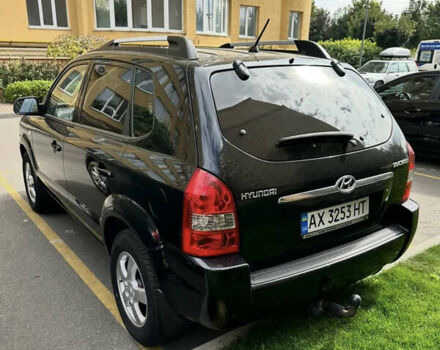 Черный Хендай Туксон, объемом двигателя 1.98 л и пробегом 273 тыс. км за 6100 $, фото 2 на Automoto.ua