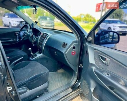 Черный Хендай Туксон, объемом двигателя 2 л и пробегом 227 тыс. км за 8200 $, фото 16 на Automoto.ua