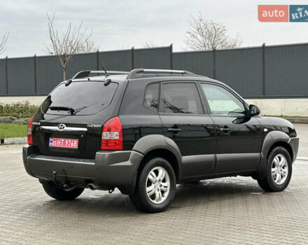 Чорний Хендай Туксон, об'ємом двигуна 2 л та пробігом 230 тис. км за 6850 $, фото 8 на Automoto.ua