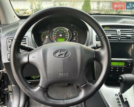 Черный Хендай Туксон, объемом двигателя 1.98 л и пробегом 147 тыс. км за 8000 $, фото 31 на Automoto.ua