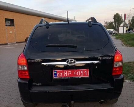 Чорний Хендай Туксон, об'ємом двигуна 1.98 л та пробігом 192 тис. км за 7950 $, фото 3 на Automoto.ua