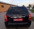 Чорний Хендай Туксон, об'ємом двигуна 1.98 л та пробігом 192 тис. км за 7950 $, фото 3 на Automoto.ua
