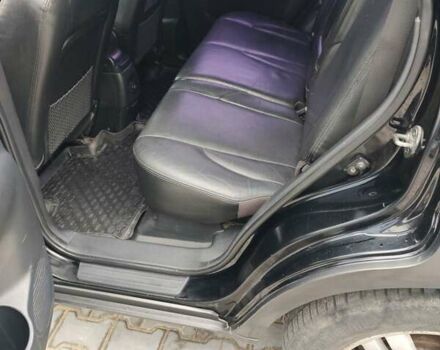 Черный Хендай Туксон, объемом двигателя 2.7 л и пробегом 280 тыс. км за 7200 $, фото 3 на Automoto.ua